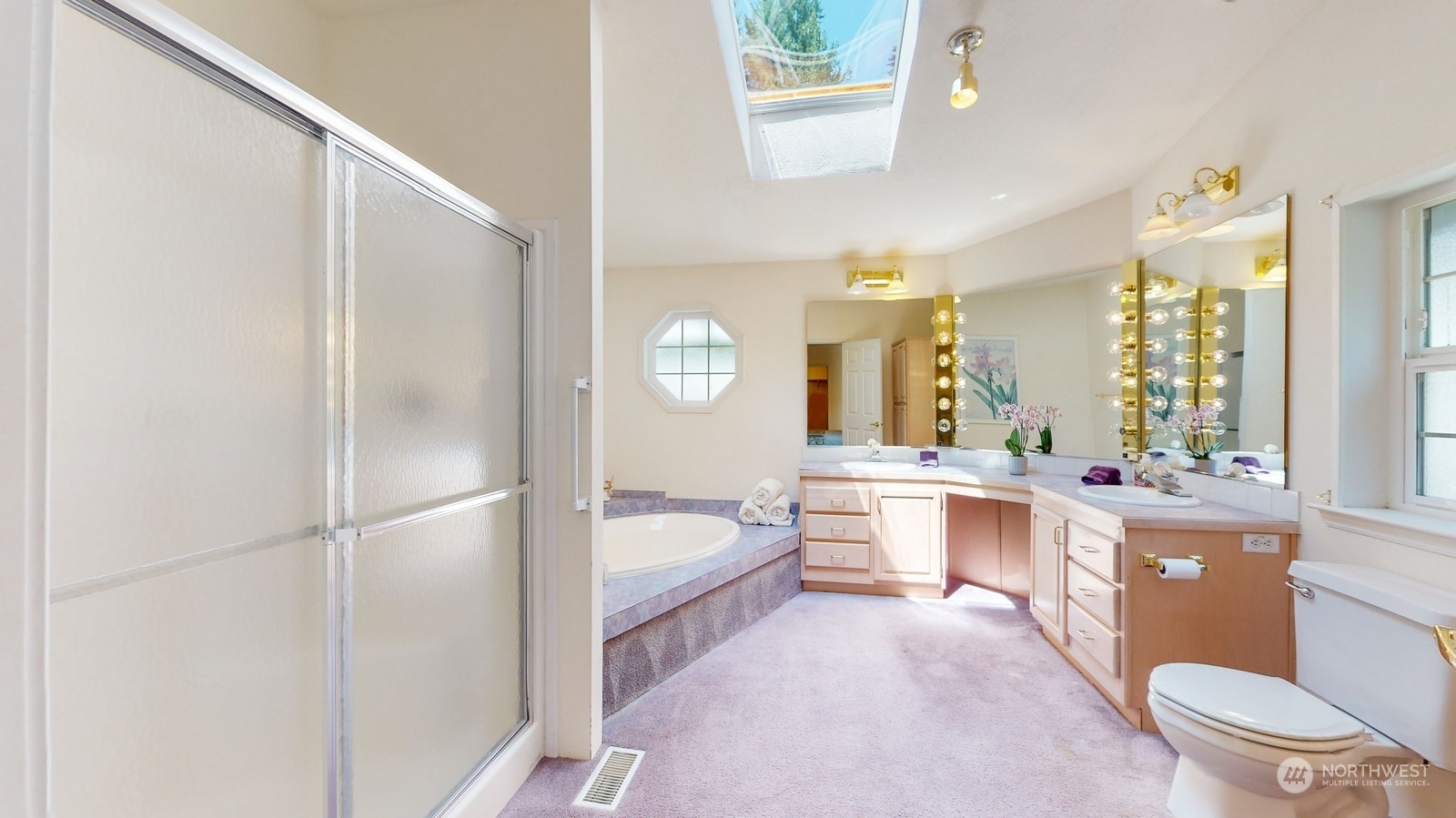5507 189th Street Southeast Bothell, WA 98012 - Photo 31 of 37 a large bathroom with a large tub and sink