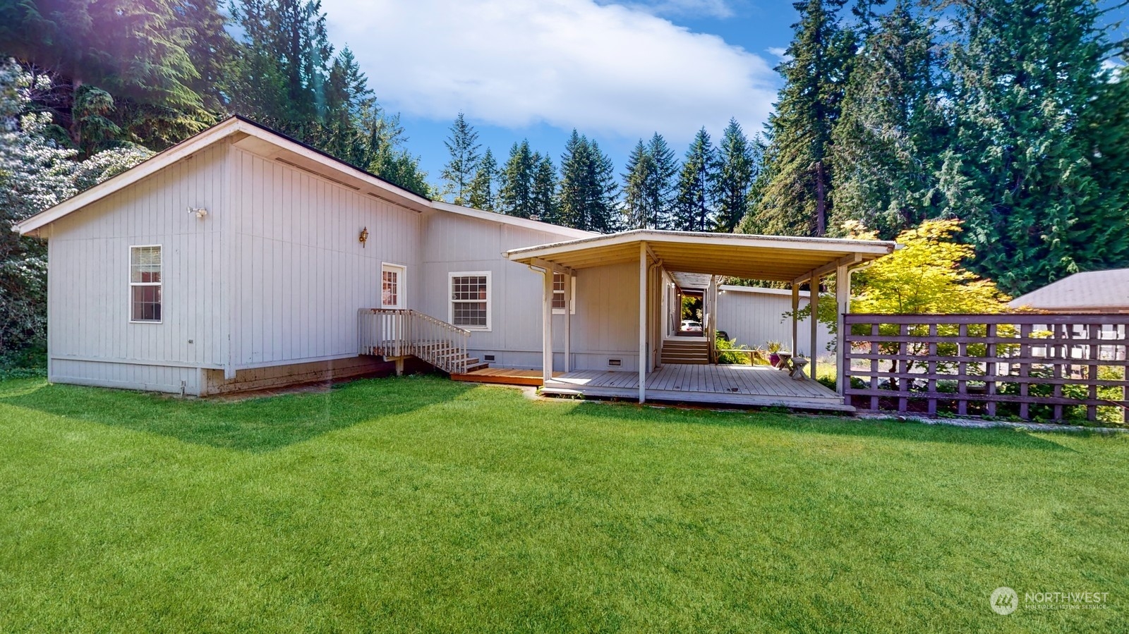 5507 189th Street Southeast Bothell, WA 98012 - Photo 33 of 37 a view of a house with backyard and garden