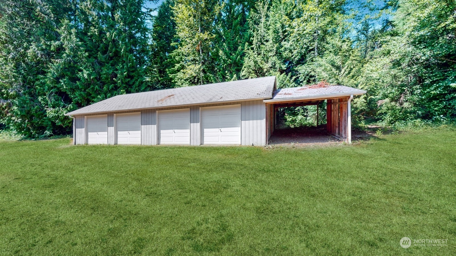 5507 189th Street Southeast Bothell, WA 98012 - Photo 36 of 37 a view of a house with a backyard