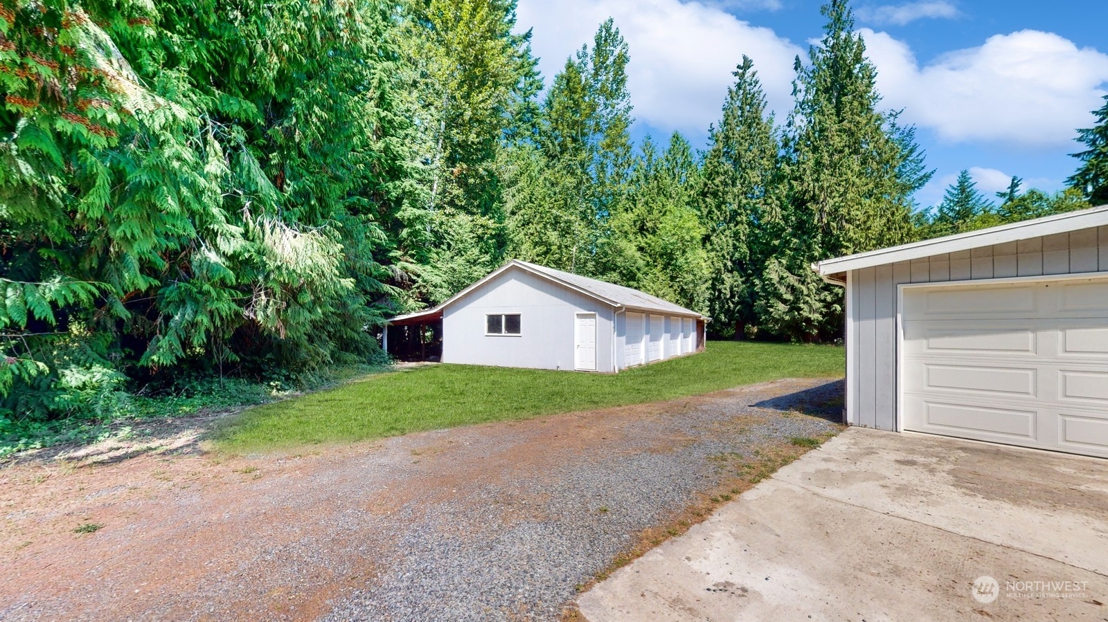 5507 189th Street Southeast Bothell, WA 98012 - Photo 37 of 37 a view of a house with a yard and large tree
