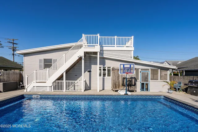 a view of living room filled with furniture and rug