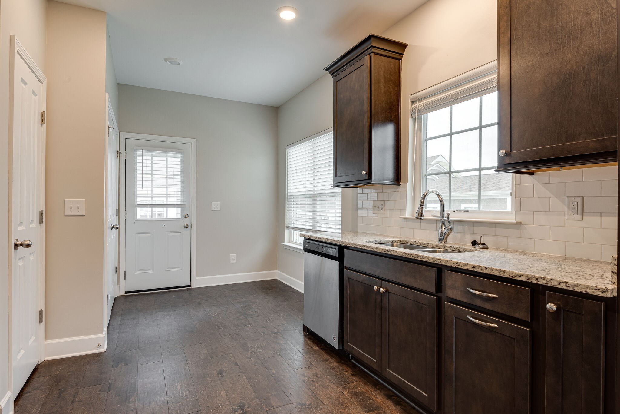269 Mary Ann Circle Spring Hill, TN 37174 - Photo 9 of 28 a kitchen with a sink stove and cabinets