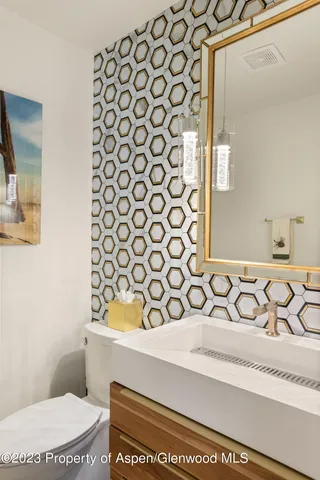 a bathroom with a sink and a toilet