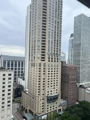 a view of a city with tall buildings