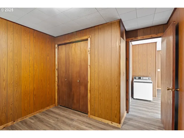 a picture of a bathroom with a shower
