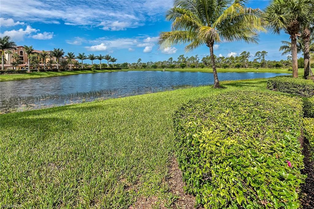 9528 Avellino Way, Unit 2515 Naples, FL 34113 - Photo 24 of 35 a view of an outdoor space and a lake view
