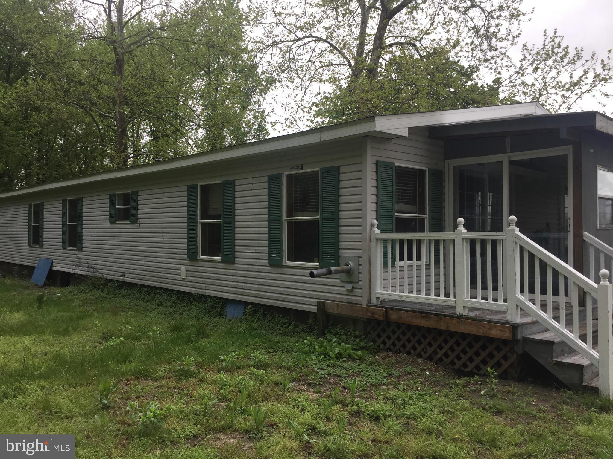 4970 Harmony Road Preston, MD 21655 - Photo 3 of 18 a view of a house with a yard