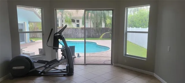 a view of a room with gym equipment
