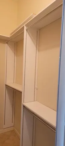 a bathroom with a shower and a sink