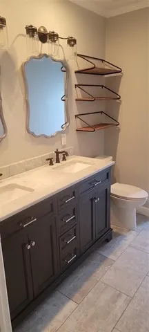 a bathroom with a sink and a toilet