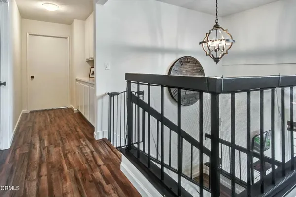 a view of entryway with wooden floor