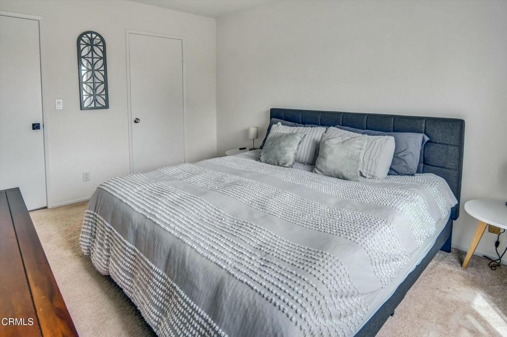 508 Village Road Port Hueneme, CA 93041 - Photo 21 of 38 a bedroom with a bed and a night stand