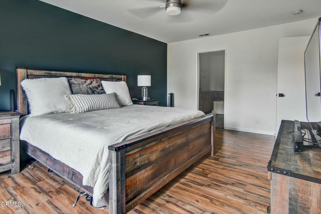 508 Village Road Port Hueneme, CA 93041 - Photo 30 of 38 a bed room with a bed and a couch