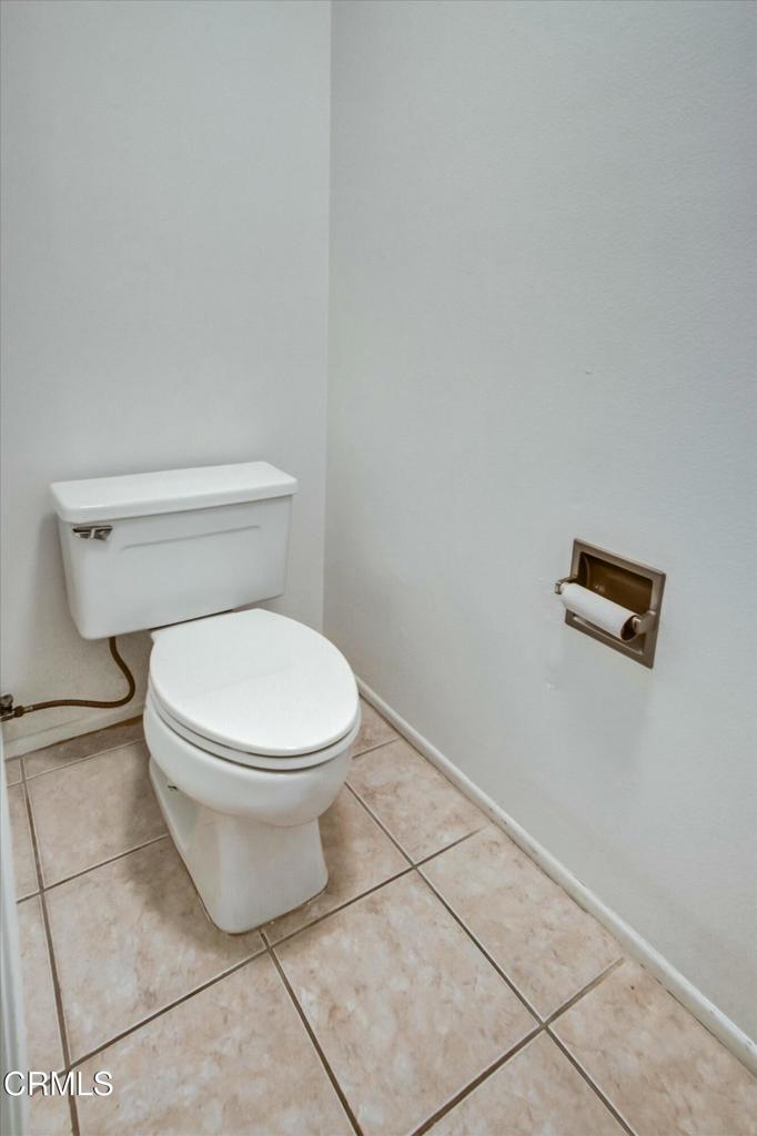 508 Village Road Port Hueneme, CA 93041 - Photo 33 of 38 a white toilet sitting next to a white wall