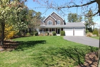 18 Red Pine Lane Wareham, MA 02571 - Photo 1 of 37 a view of a yard in front of house