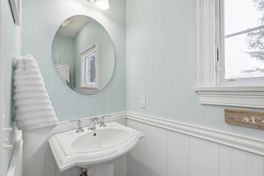 18 Red Pine Lane Wareham, MA 02571 - Photo 13 of 37 a bathroom with a sink and a mirror