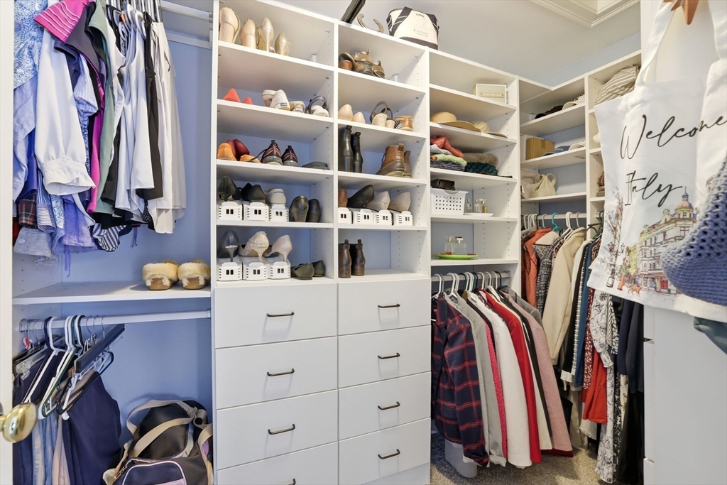 18 Red Pine Lane Wareham, MA 02571 - Photo 16 of 37 a view of walk in closet with clothes and shoes