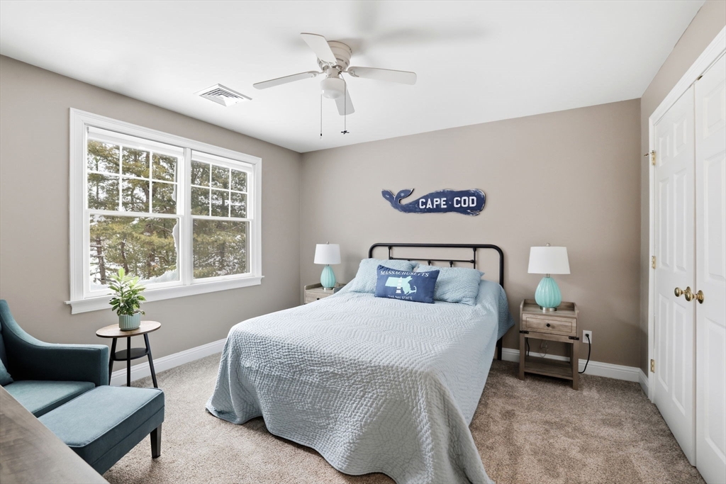 18 Red Pine Lane Wareham, MA 02571 - Photo 18 of 37 a bedroom with a bed and a couch