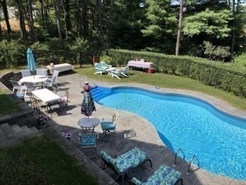 18 Red Pine Lane Wareham, MA 02571 - Photo 22 of 37 a view of backyard with swimming pool and outdoor seating