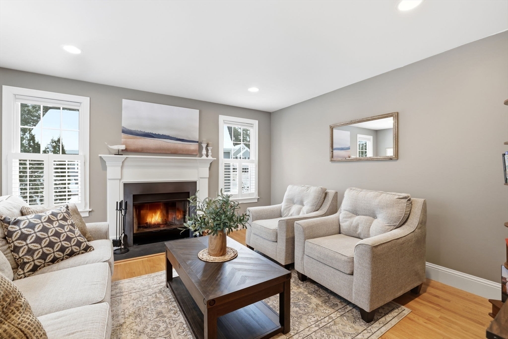 18 Red Pine Lane Wareham, MA 02571 - Photo 6 of 37 a living room with furniture and a fireplace