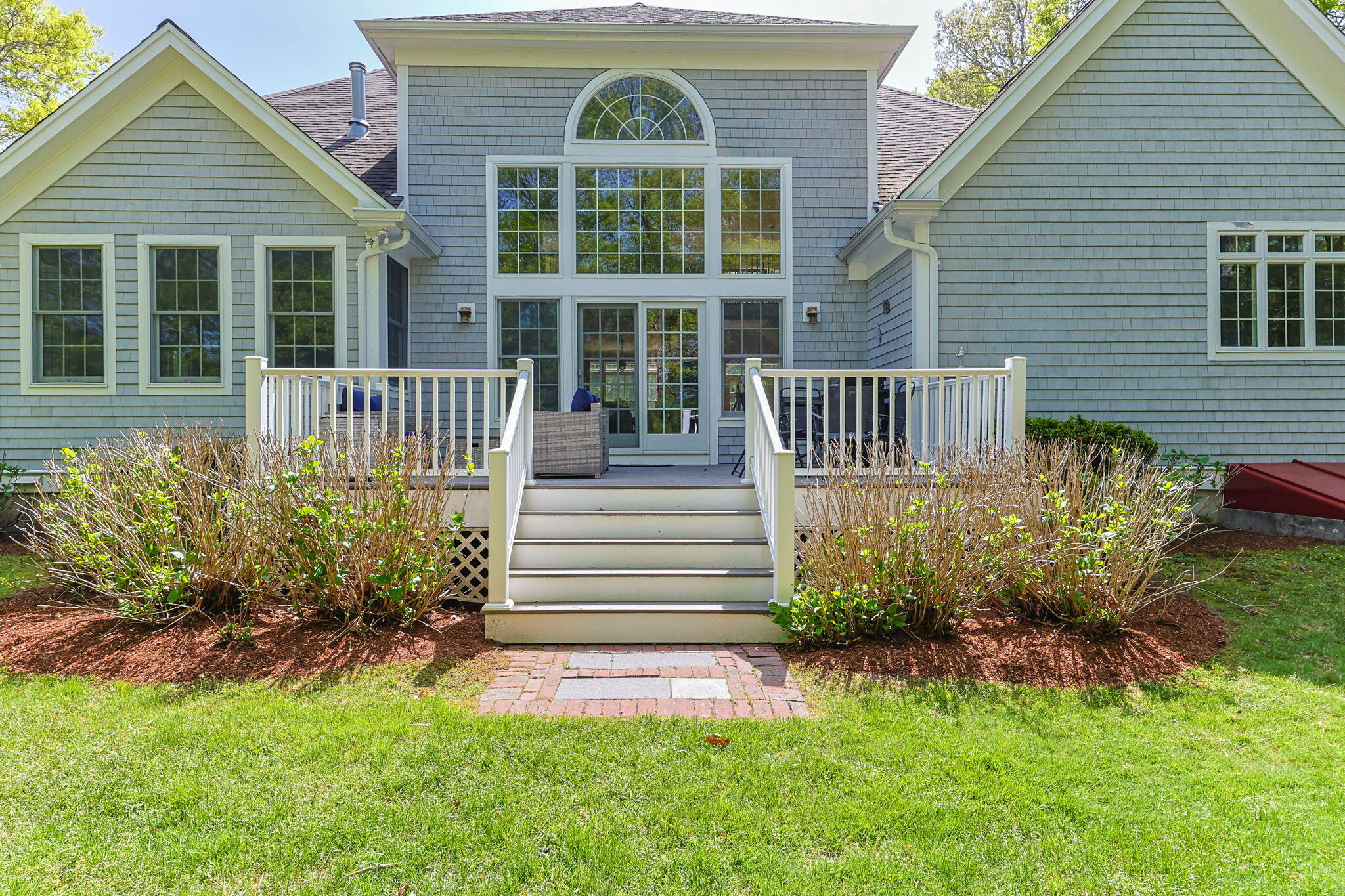 17 Payamps Road Mashpee, MA 02649 - Photo 57 of 72 front view of a house with a yard