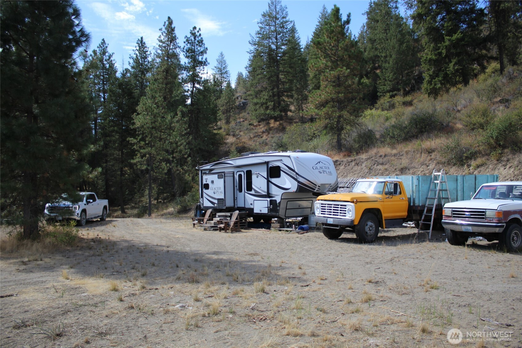 36605 Teel Hill Road North Davenport, WA 99122 - Photo 10 of 10 a car parked in front of a house