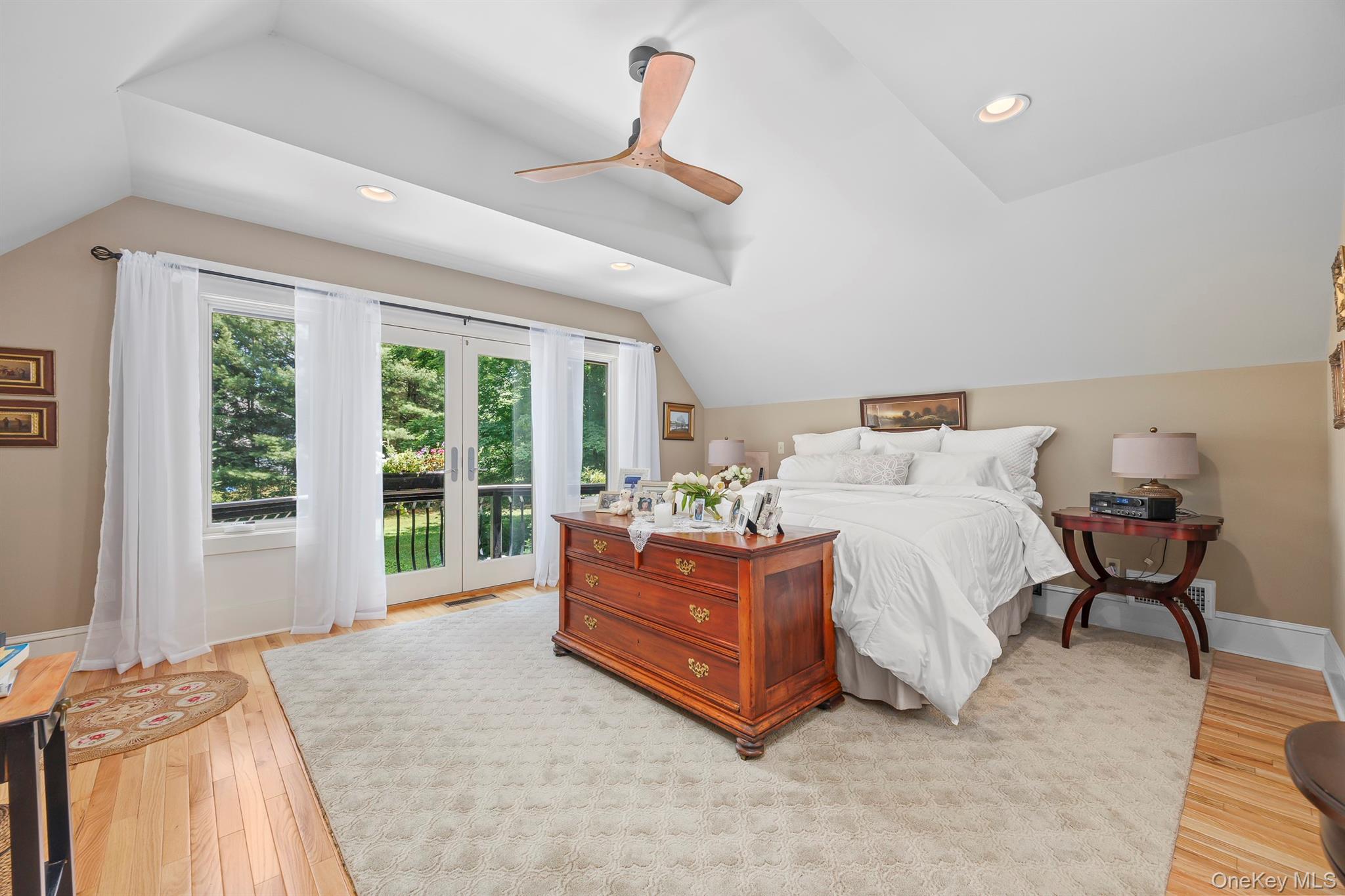 183 Titusville Road Poughkeepsie, NY 12603 - Photo 18 of 27 A very large, fabulous light-filled primary bedroom with a juliet balcony overlooks the back yard