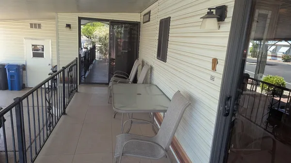 a view of balcony and furniture