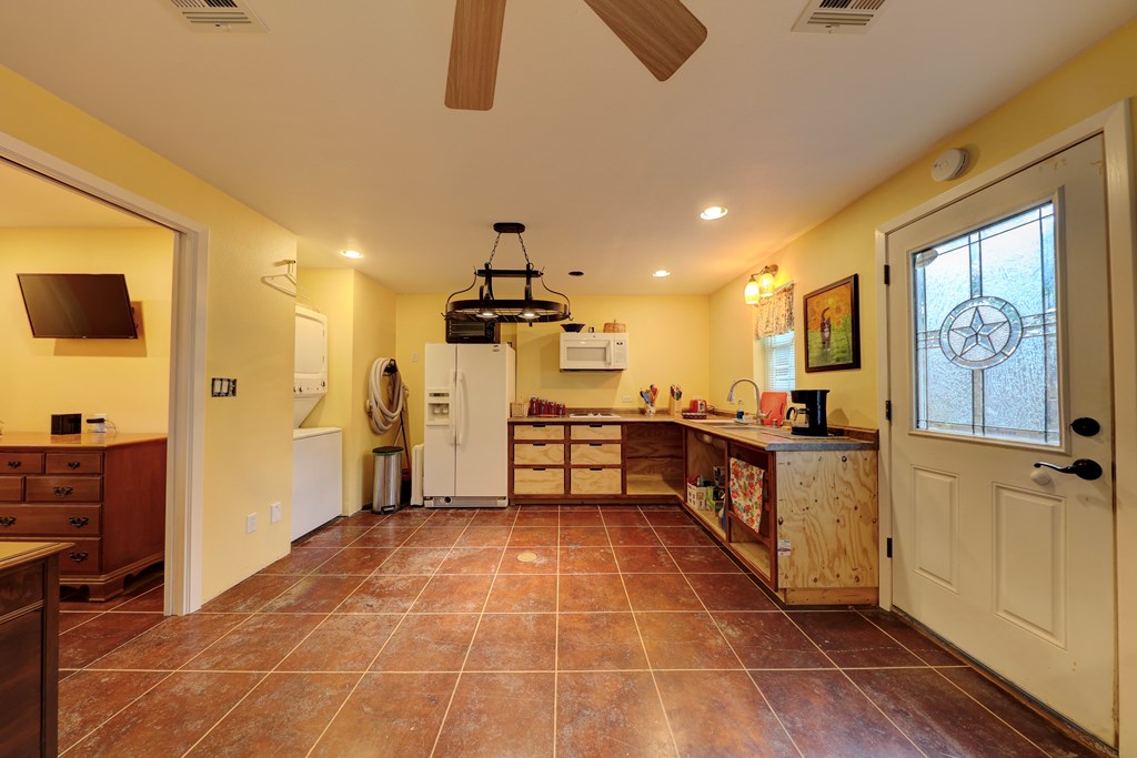 206 Austin Street Ingram, TX 78025 - Photo 8 of 18 a view of a room with shelves