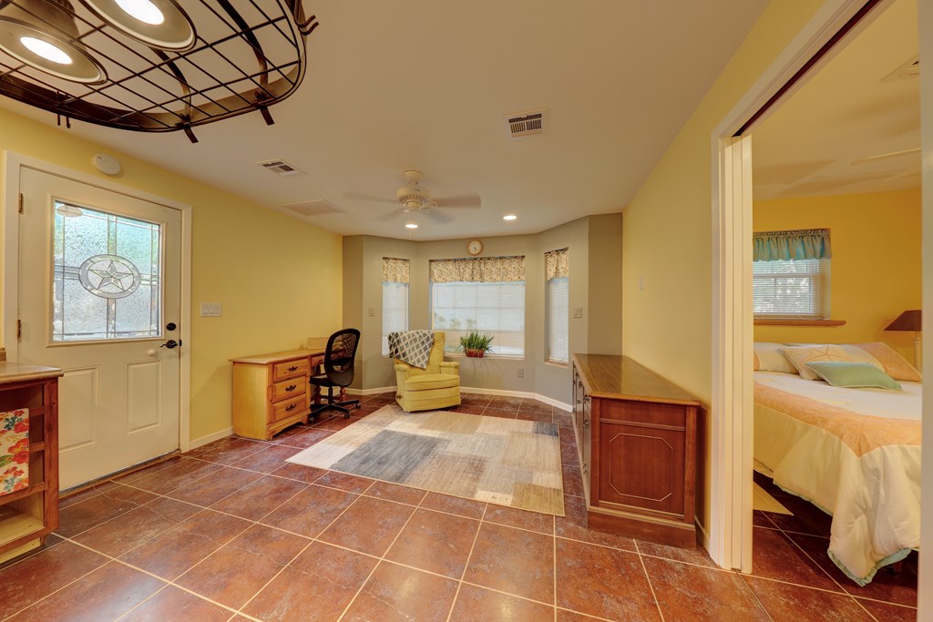 206 Austin Street Ingram, TX 78025 - Photo 10 of 18 a lobby with furniture and a rug
