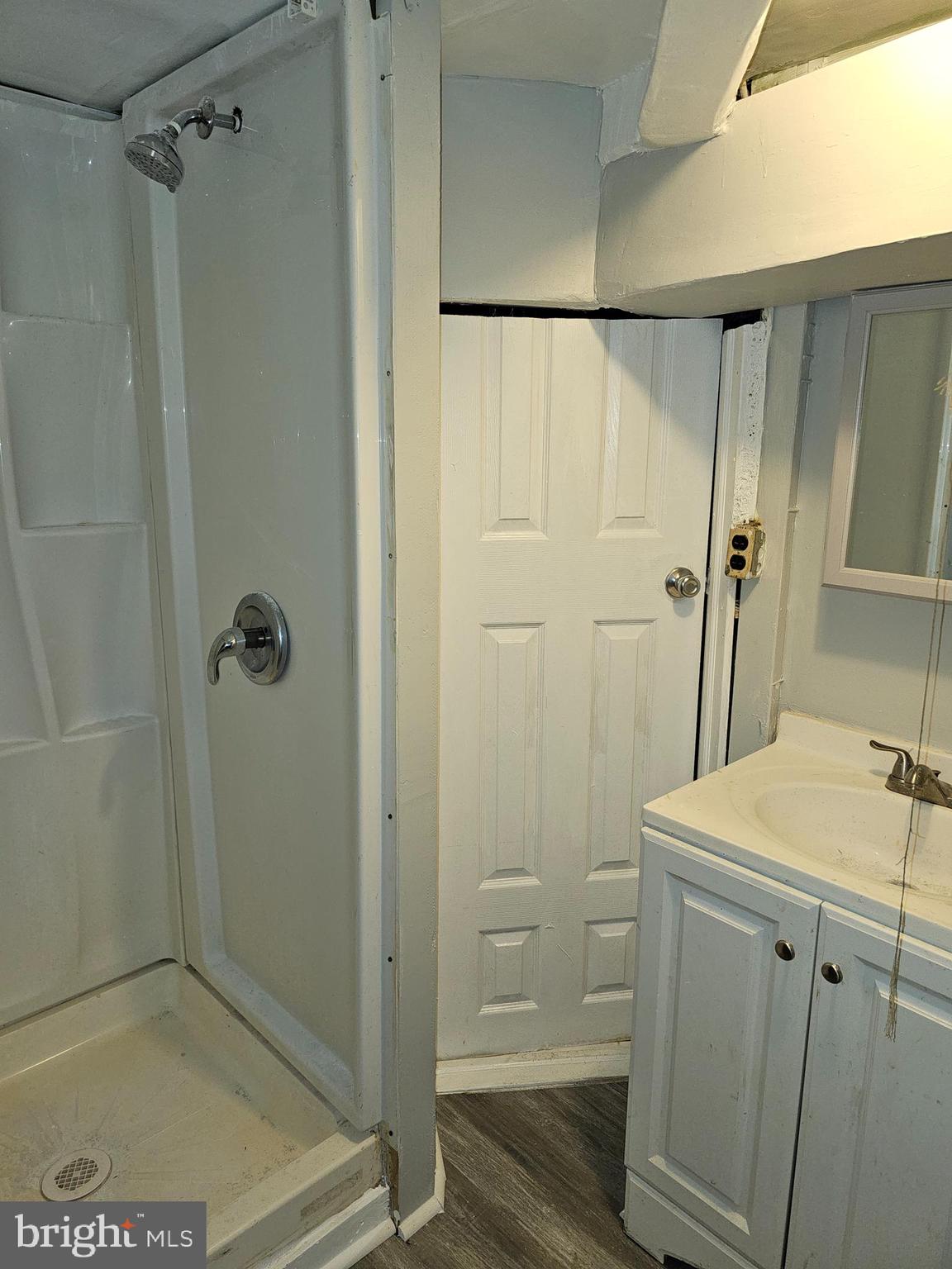 3607 Belair Road, Unit BSMT Baltimore, MD 21213 - Photo 14 of 14 a bathroom with a shower and a sink