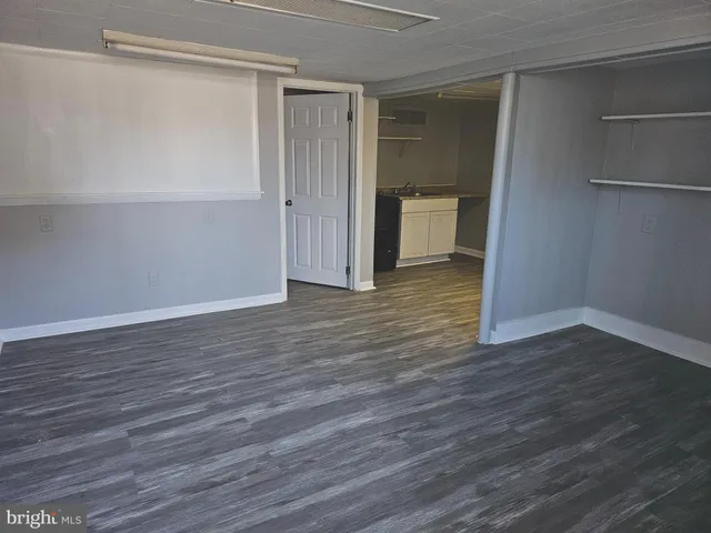 a view of a storage & utility room with washer and dryer
