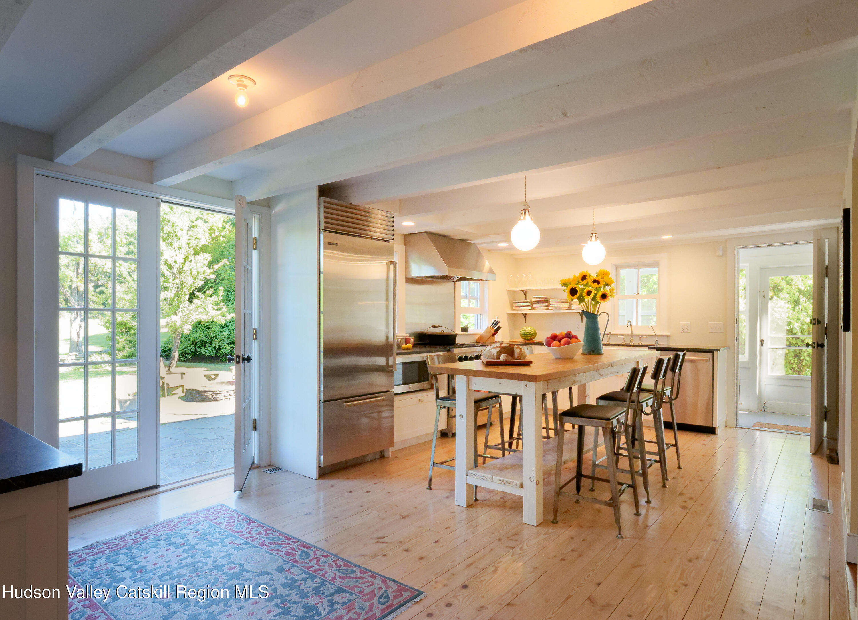 5 Fulton Homestead Road Red Hook, NY 12571 - Photo 15 of 41 a view of a dining room with furniture window and wooden floor