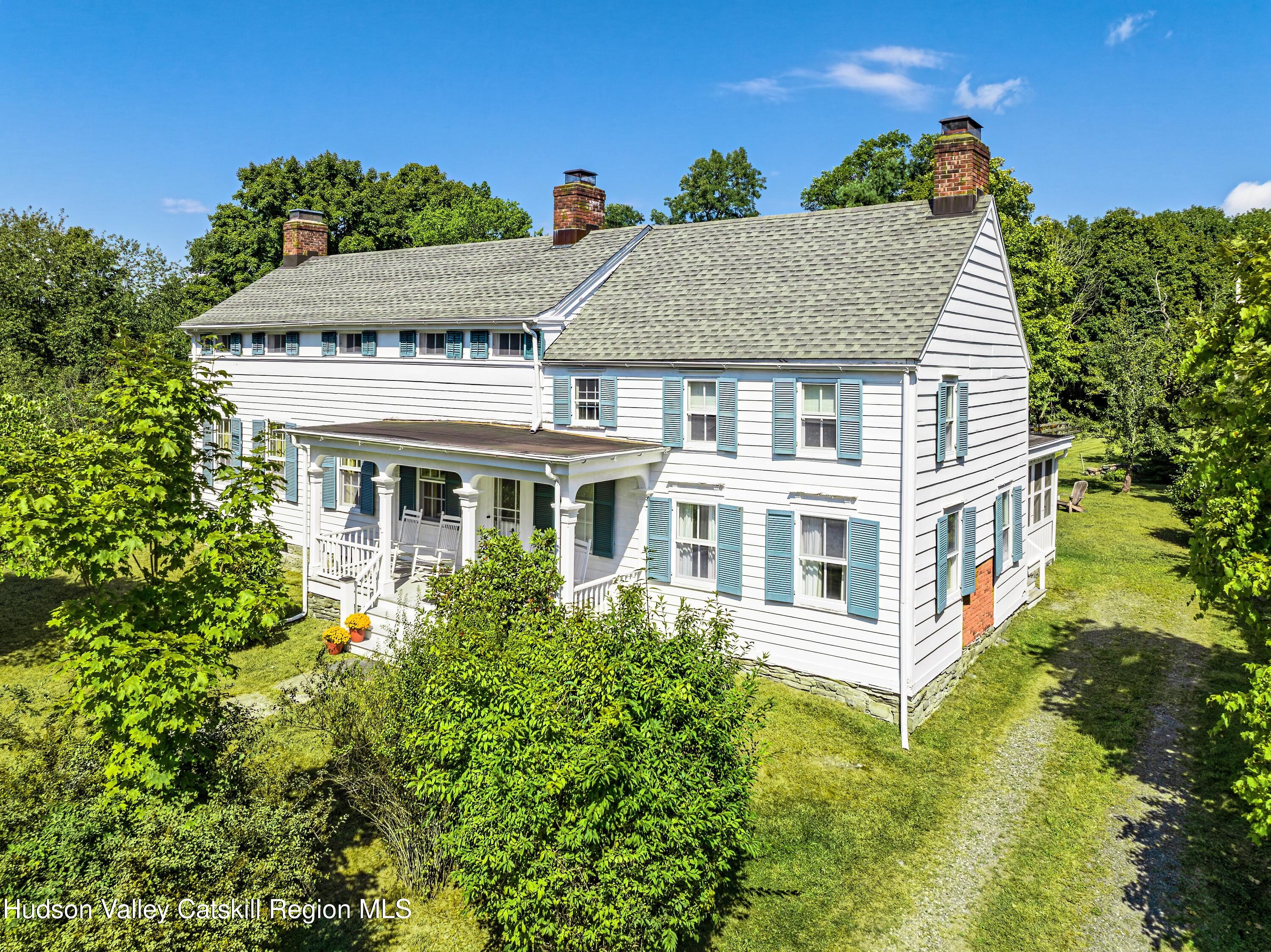 5 Fulton Homestead Road Red Hook, NY 12571 - Photo 2 of 41 front view of a house with a yard
