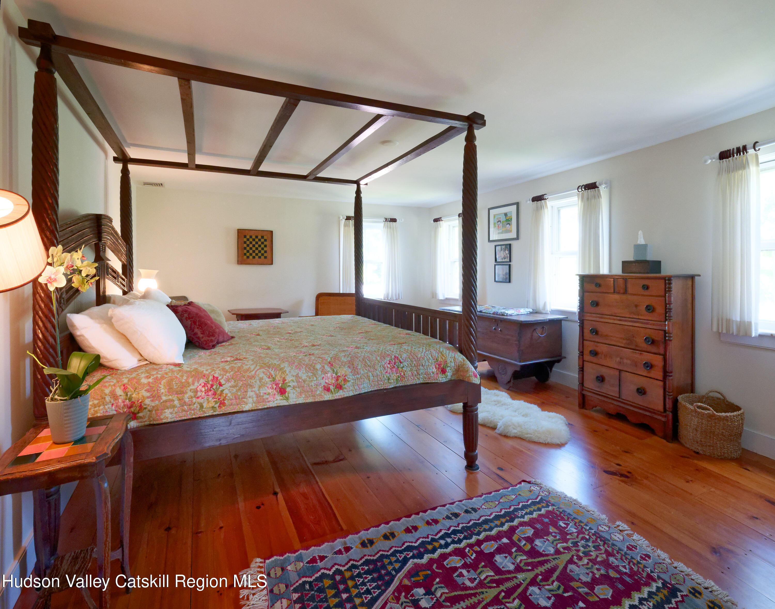5 Fulton Homestead Road Red Hook, NY 12571 - Photo 21 of 41 a bedroom with a bed and wooden floor