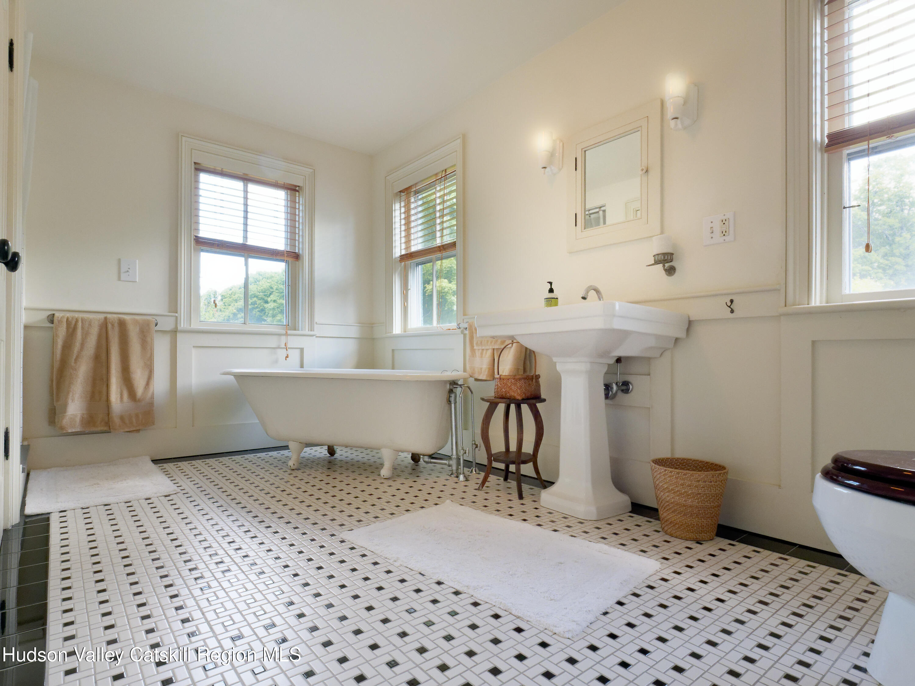 5 Fulton Homestead Road Red Hook, NY 12571 - Photo 23 of 41 a bathroom with a sink toilet a mirror and window