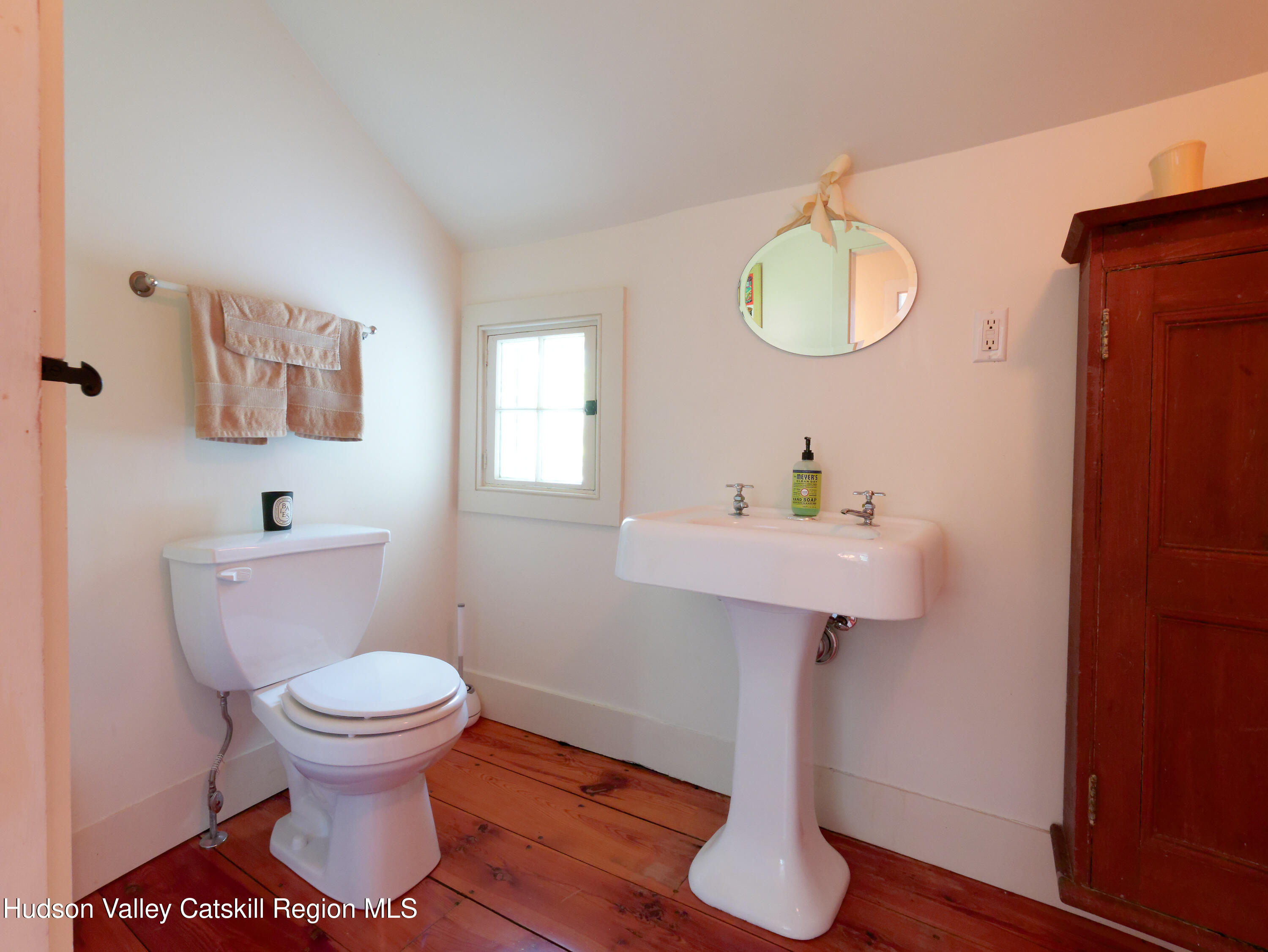 5 Fulton Homestead Road Red Hook, NY 12571 - Photo 25 of 41 a bathroom with a toilet sink and mirror