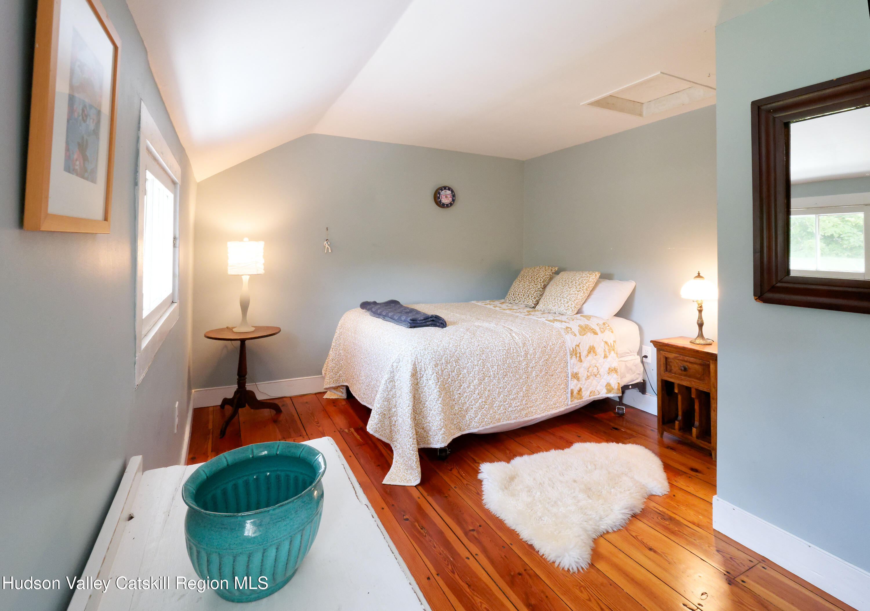 5 Fulton Homestead Road Red Hook, NY 12571 - Photo 26 of 41 a bedroom with a bed and a mirror