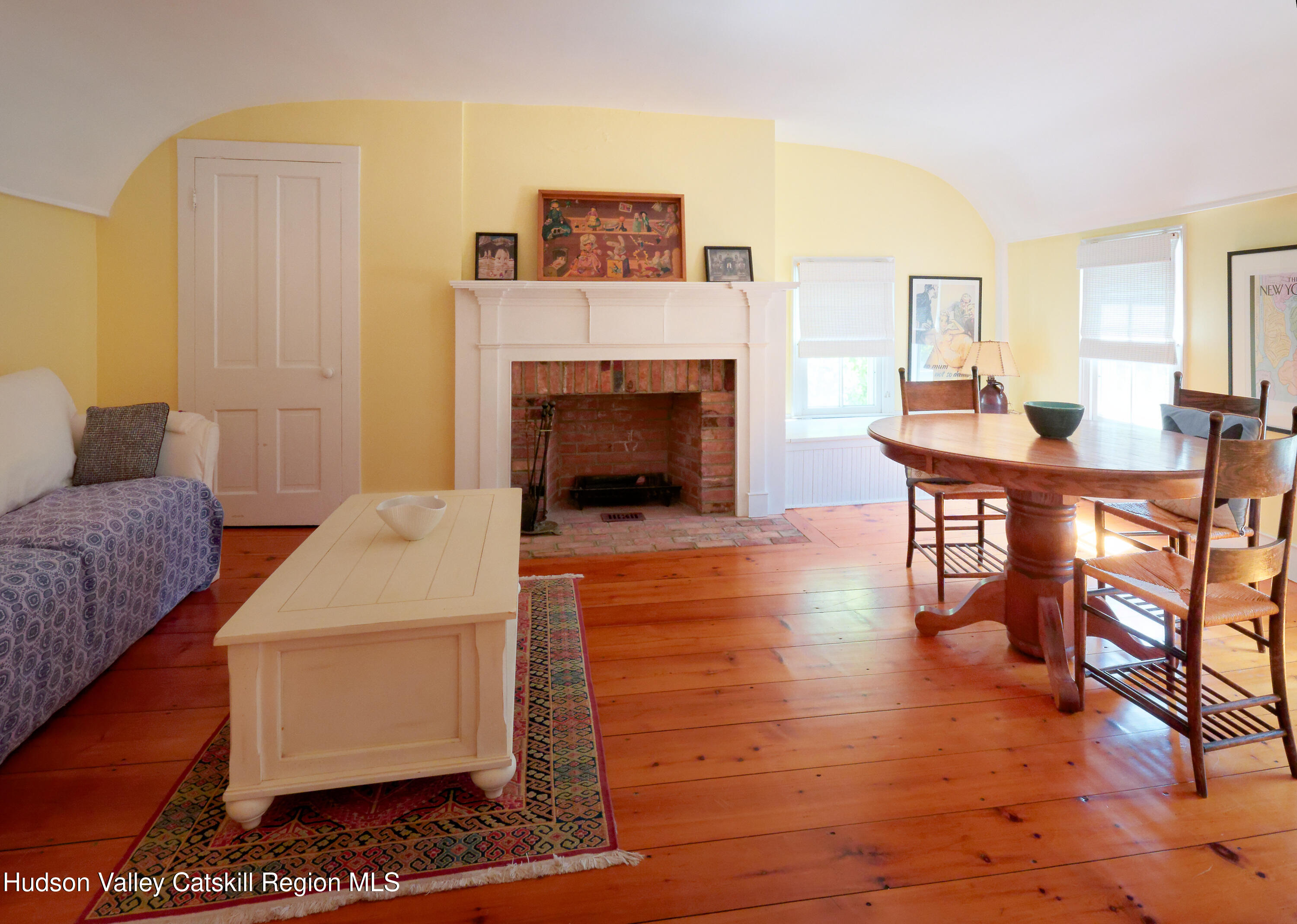 5 Fulton Homestead Road Red Hook, NY 12571 - Photo 28 of 41 a living room with furniture and a fireplace