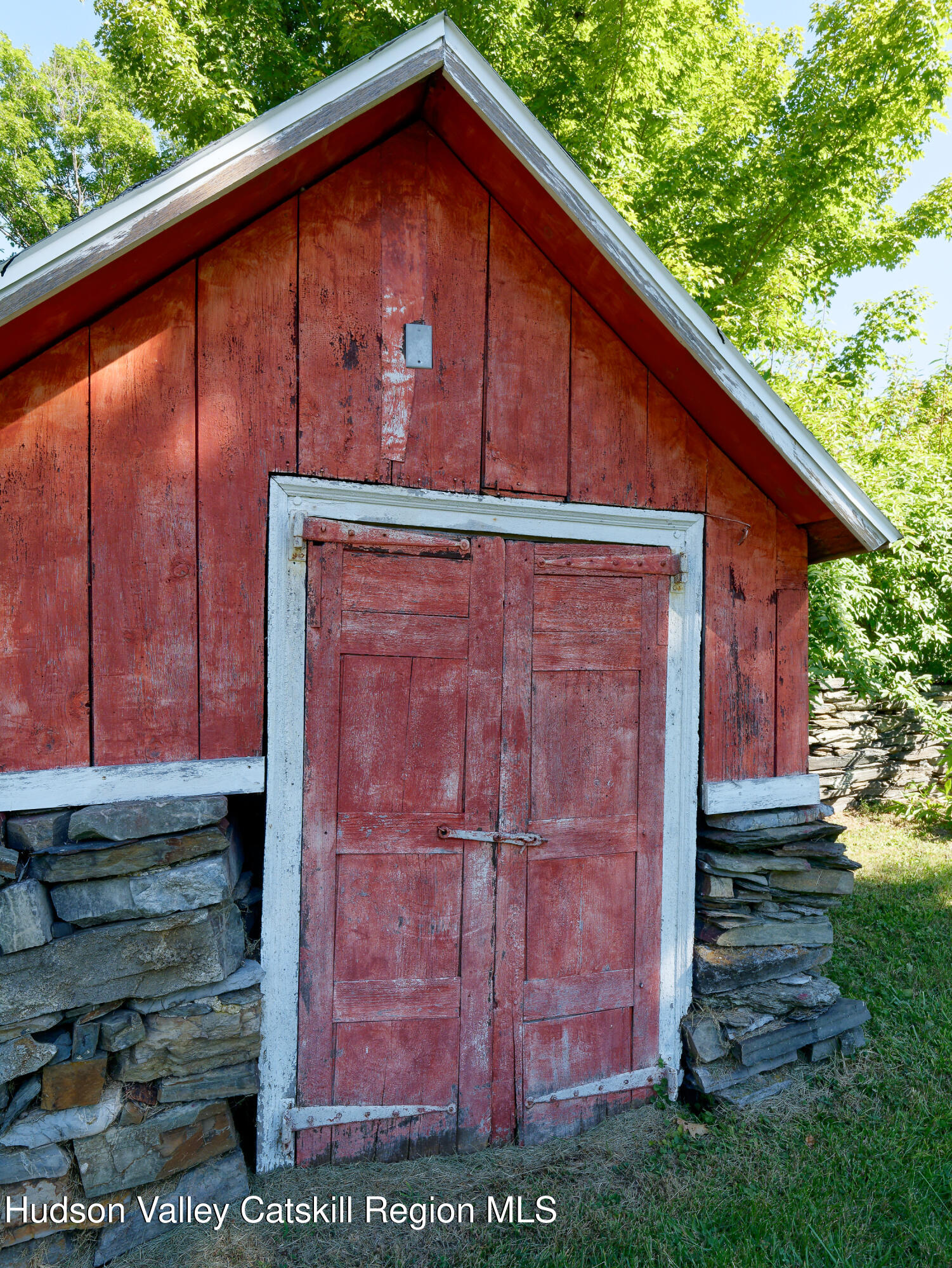5 Fulton Homestead Road Red Hook, NY 12571 - Photo 35 of 41 a front view of a house with a garden