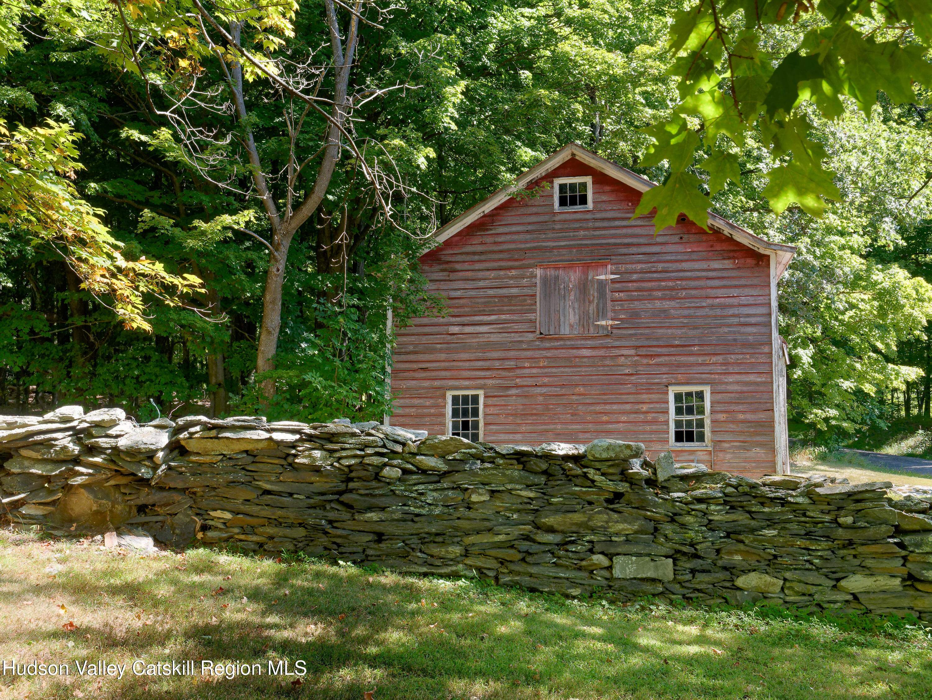 5 Fulton Homestead Road Red Hook, NY 12571 - Photo 37 of 41 a front view of a house with garden