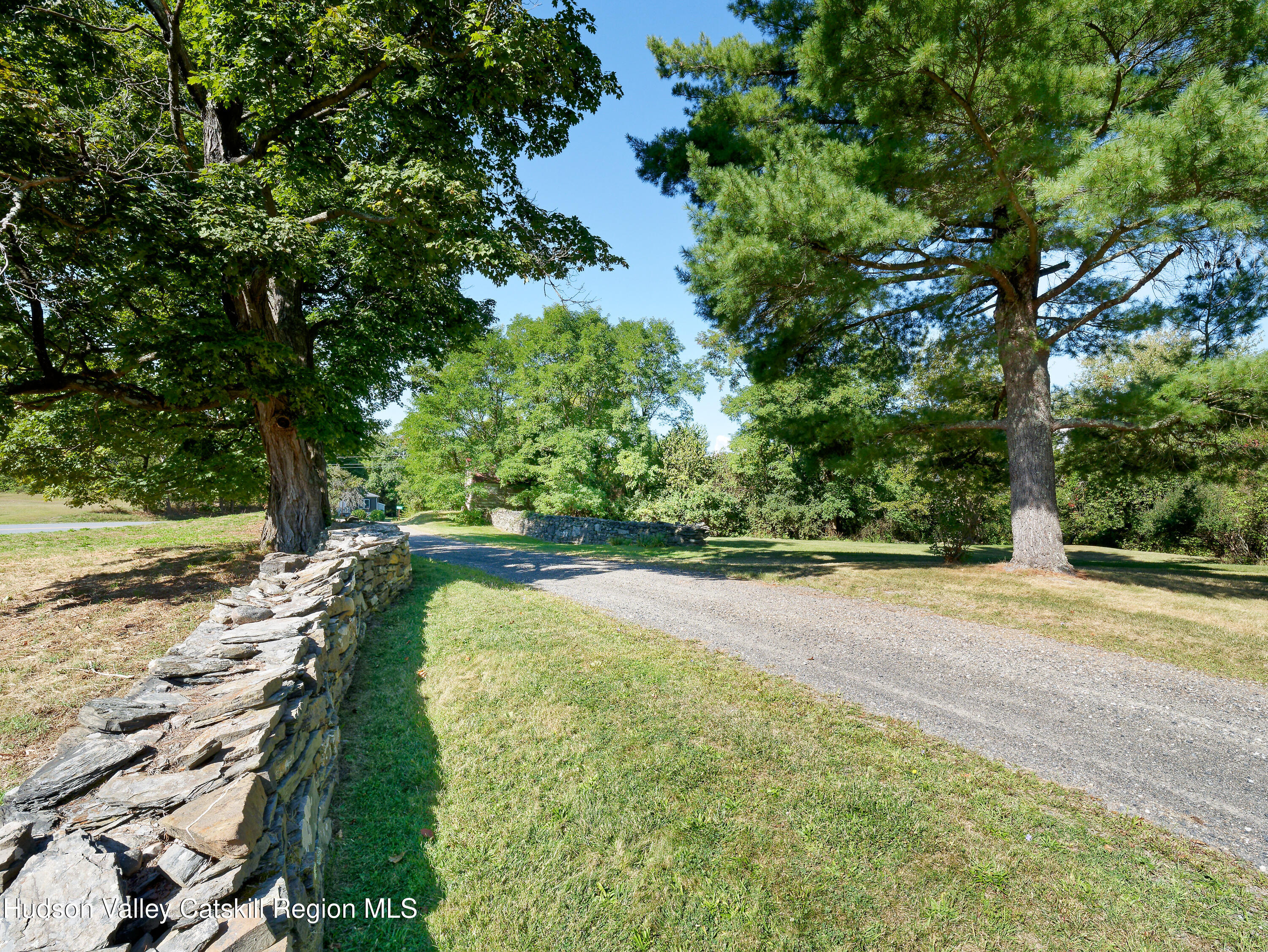 5 Fulton Homestead Road Red Hook, NY 12571 - Photo 9 of 41 a view of a yard with large trees