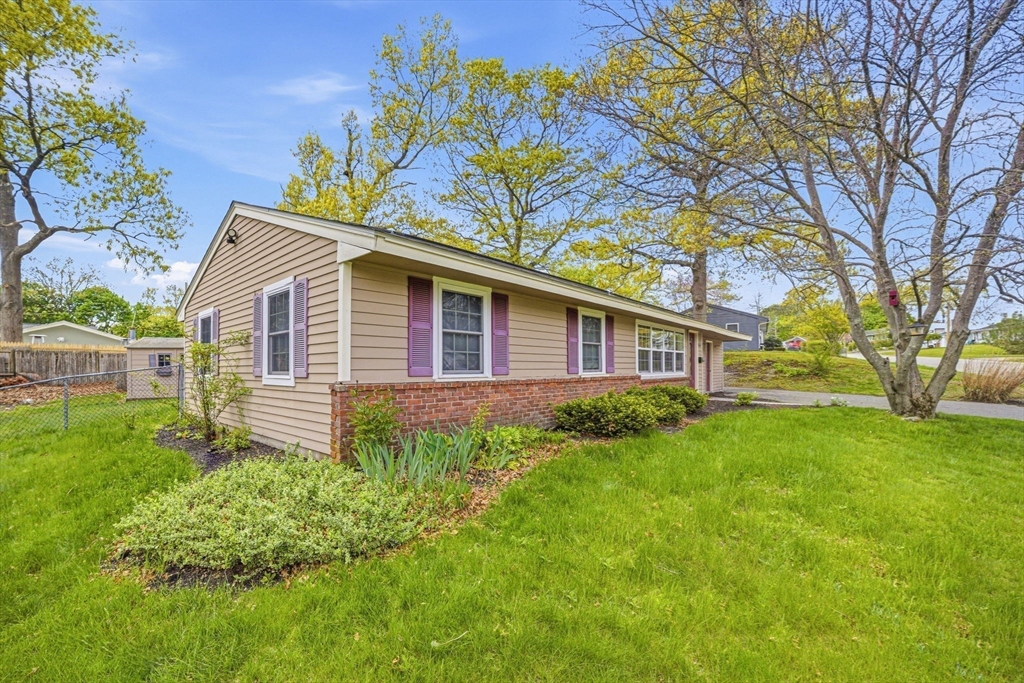 157 Errol Road Brockton, MA 02302 - Photo 4 of 34 a front view of a house with garden