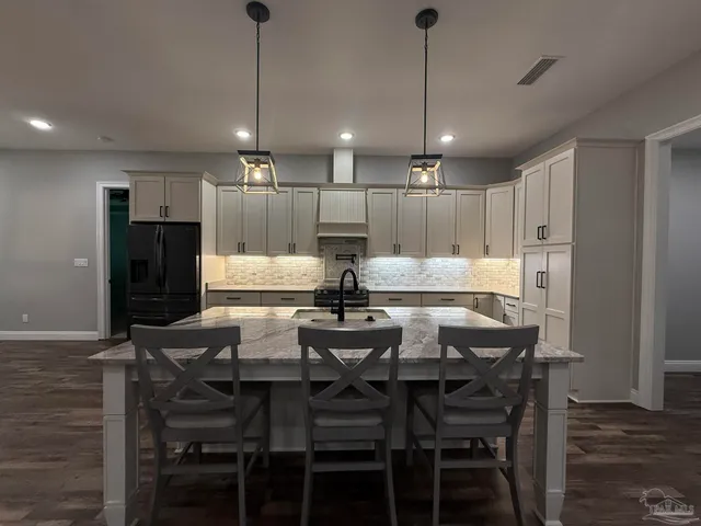 $624,975 | 4825 Royal Pines Drive, Pace, FL 32571