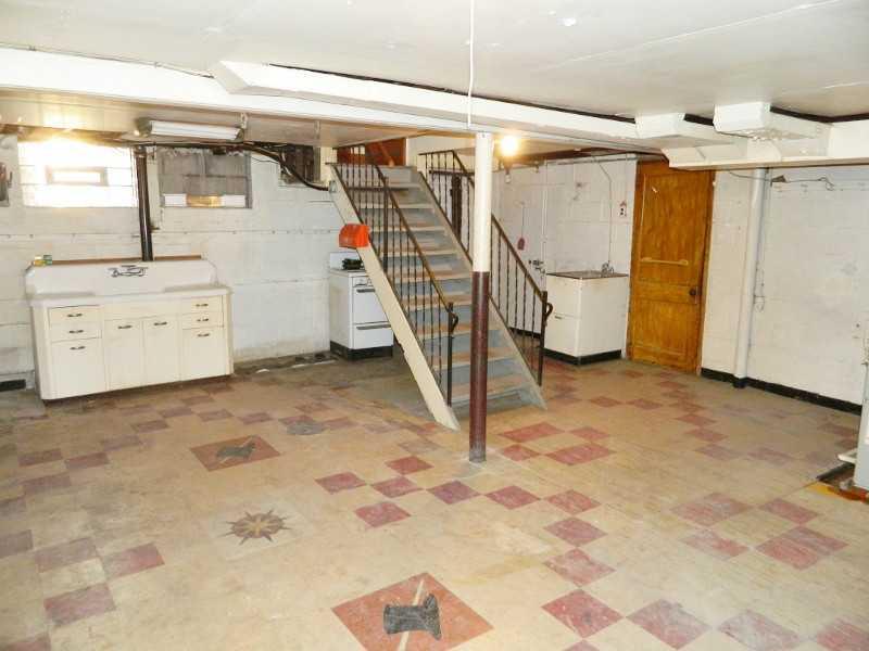975 Ridge Road Ambridge, PA 15003 - Photo 18 of 25 Basement/Game Room. Basement has tons of storage. There is also a second storage area with a stone fireplace.