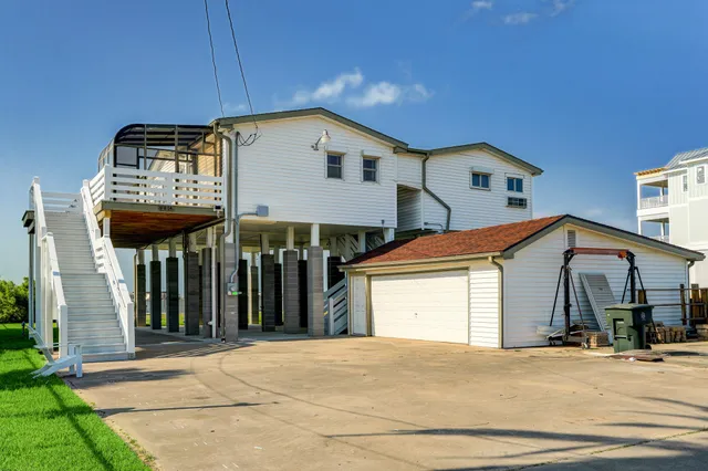 a view of a house with a garage