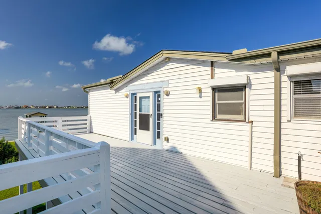 a view of a house with a roof deck
