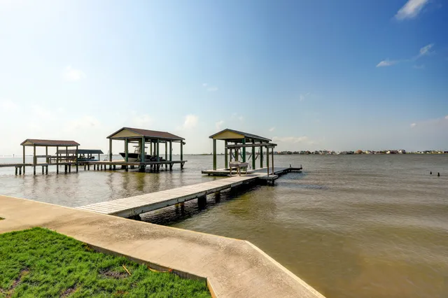 a view of a swimming pool with an ocean view