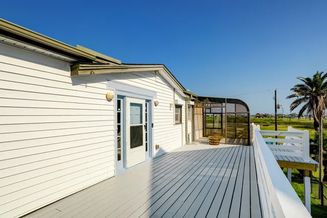 a front view of a house with a ocean view