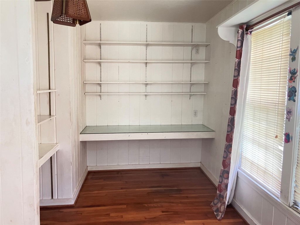 5012 Winding Way Dickinson, TX 77539 - Photo 15 of 23 a view of a small space with wooden floor and staircase